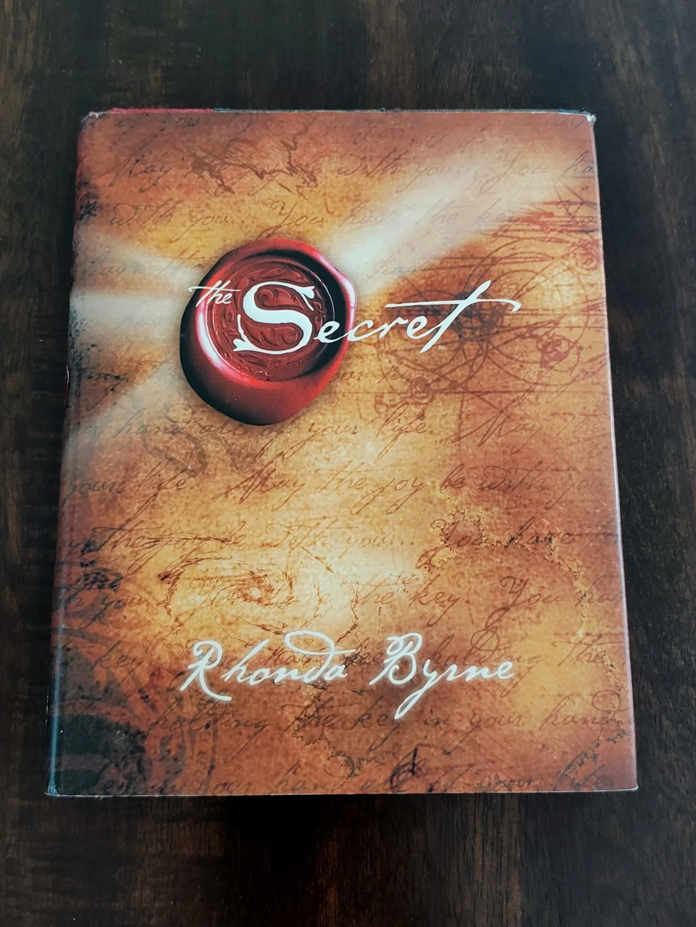 The Secret by — Brown Decorative Book Cover